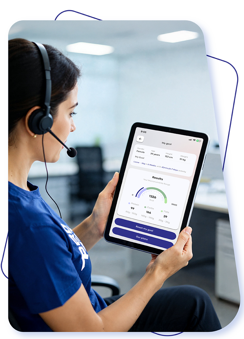 A Protein dietitian holding a tablet showing the calorie results for a customer